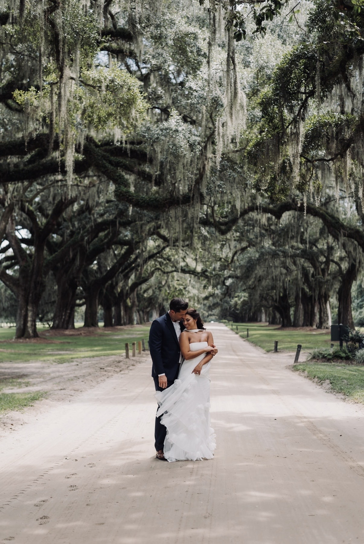 Chloe and Sam beneath a sweeping canopy of Spanish moss